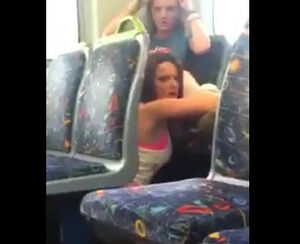 Dissolute dame munching out her mate on public transport