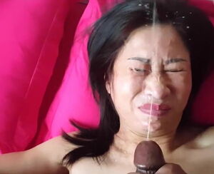 Chinese Mummy blows her Ebony Jizz-shotgun and gets her face