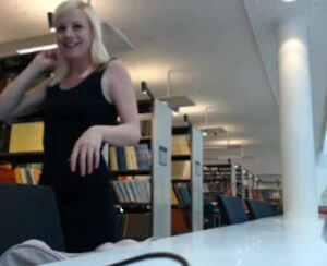 Completely bare blond teenager displaying in library and get